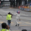 Jazeman Jaafar drives the Mercedes AMG Petronas W03 Formula 1 car around the streets of Kuala Lumpur