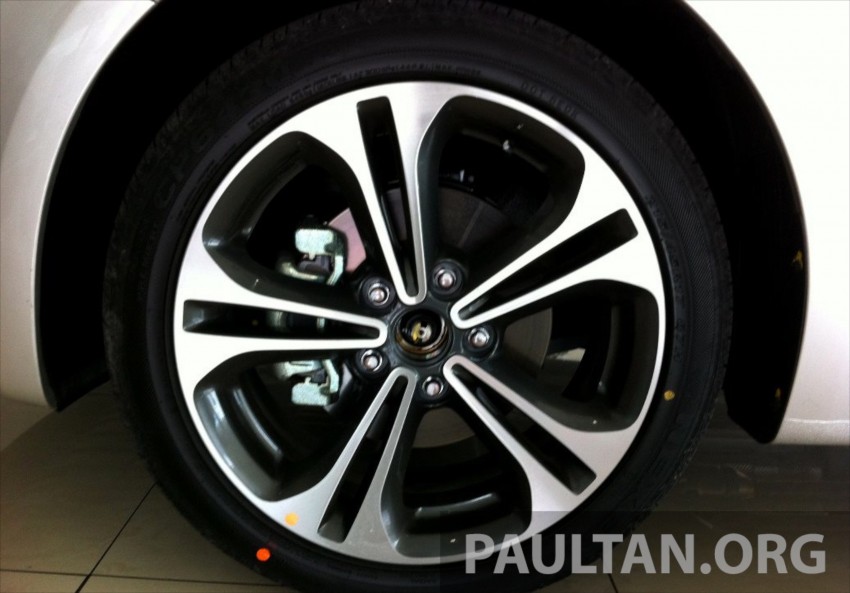 GALLERY: Kia Cerato at the showroom with brochure 184381