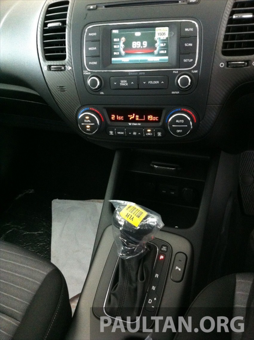 GALLERY: Kia Cerato at the showroom with brochure 184377