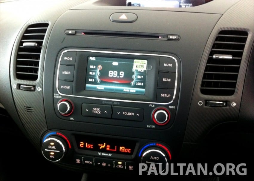 GALLERY: Kia Cerato at the showroom with brochure 184378