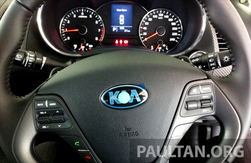 GALLERY: Kia Cerato at the showroom with brochure 184376