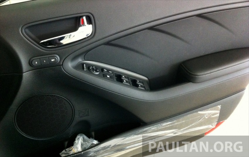 GALLERY: Kia Cerato at the showroom with brochure 184358