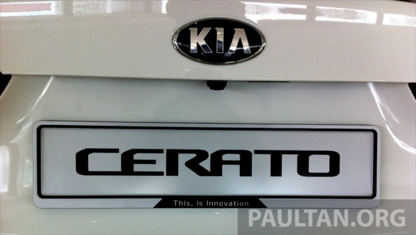 GALLERY: Kia Cerato at the showroom with brochure 184351