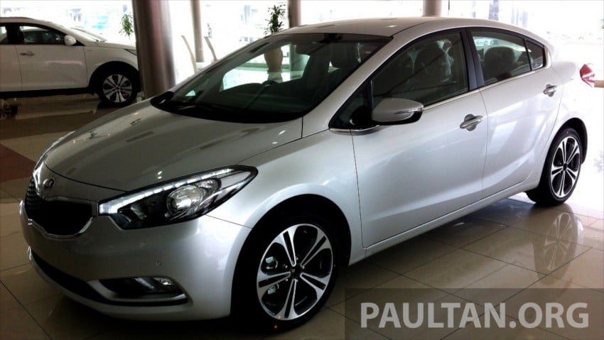 GALLERY: Kia Cerato at the showroom with brochure 184347