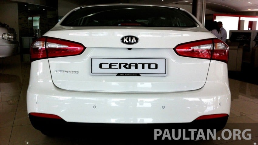 GALLERY: Kia Cerato at the showroom with brochure 184393