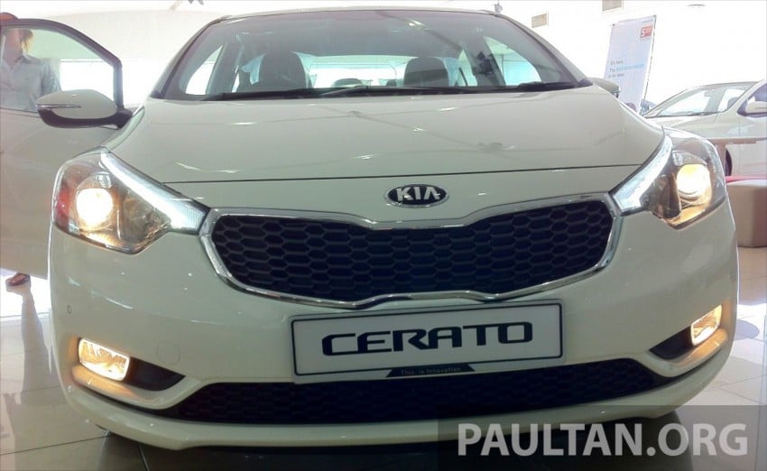 GALLERY: Kia Cerato at the showroom with brochure 184394