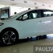 GALLERY: Kia Cerato at the showroom with brochure