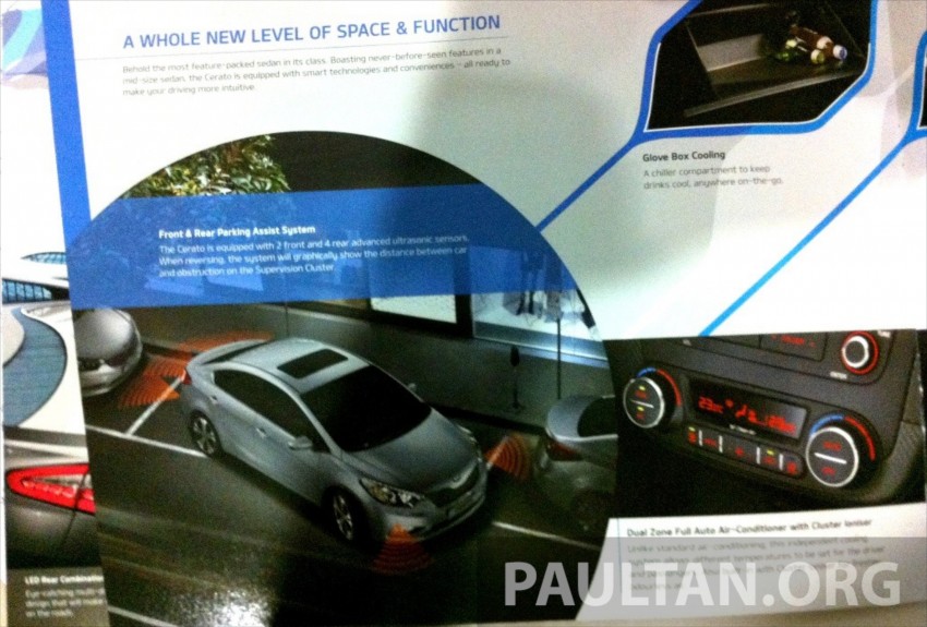 GALLERY: Kia Cerato at the showroom with brochure 184382