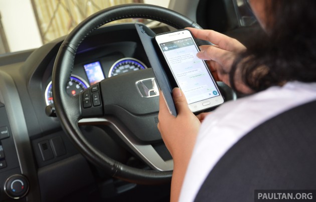 Singapore to penalise drivers holding mobile phones, lower alcohol limits, tighten penalties with new law