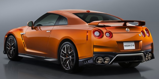 The 2017 GT-R's exterior receives a thorough makeover. The new "V-motion" grille, one of Nissan's latest design signatures, has been slightly enlarged to provide better engine cooling and now features a matte chrome finish and an updated mesh pattern. A new hood, featuring pronounced character lines flowing flawlessly from the grille, has been reinforced to enhance stability during high-speed driving. A freshly designed front spoiler lip and front bumpers with finishers situated immediately below the headlamps give the new GT-R the look of a pure-bred racecar, while generating high levels of front downforce.