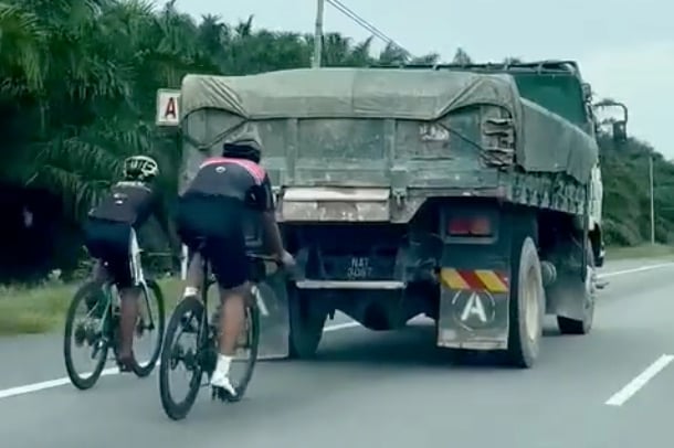Dear Malaysian cyclists, vehicle drafting is dangerous