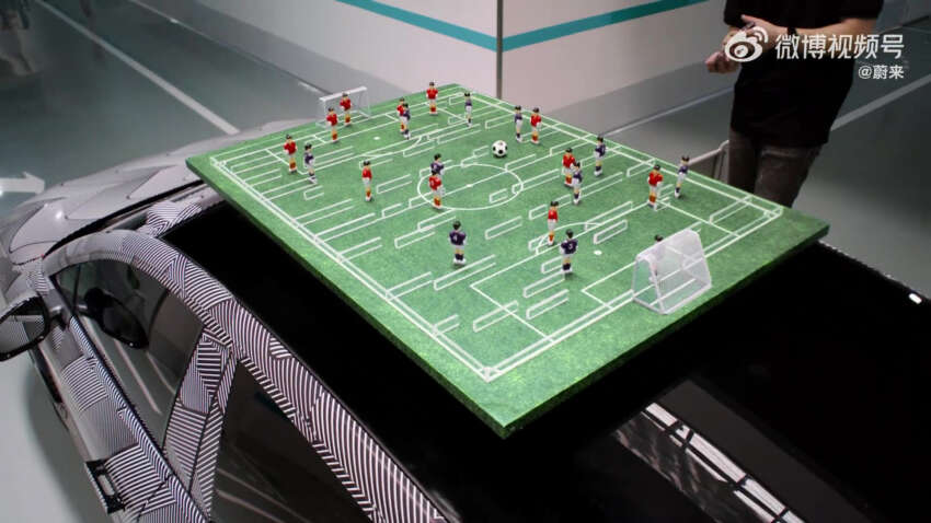 Nio ET9 shows off SkyRide active suspension system with tilt football game and juggling a ball on its roof 1790136