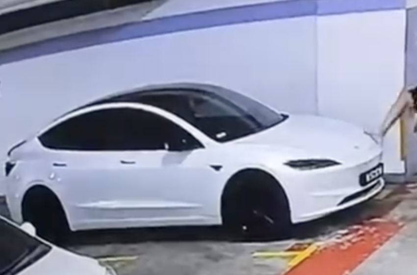 Tesla Model 3 gets kicked, spat on by passer-by – Malaysia needs anti-vandalism laws to curb these acts 1815672