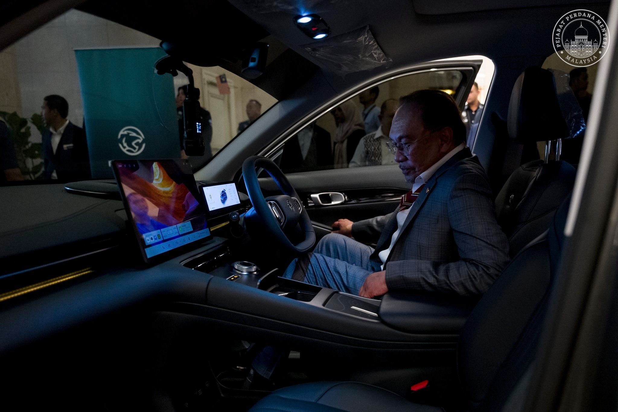 Anwar Ibrahim test drives Proton eMas 7, calls it a proud achievement of Malaysian automotive landscape