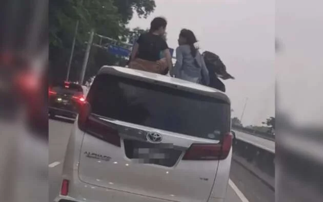 PDRM investigating video of kids sitting on Alphard roof