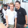 Mercedes GP F1 driver Nico Rosberg refuels lucky customers’ cars at Petronas’ 1,001st station