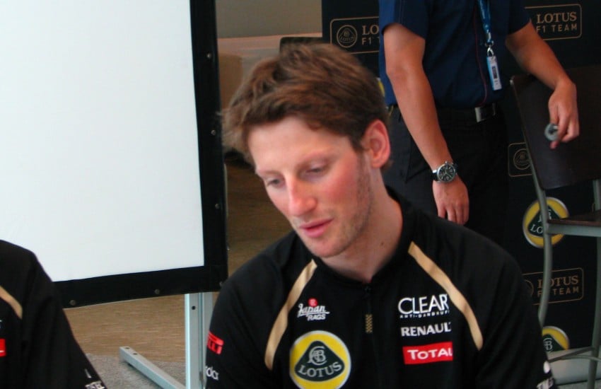 Lotus F1 Team: Kimi Raikkonen and Romain Grosjean at Proton Centre of Excellence, Shah Alam 95326