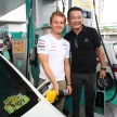 Mercedes GP F1 driver Nico Rosberg refuels lucky customers’ cars at Petronas’ 1,001st station