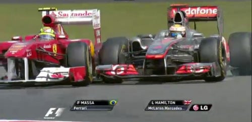British GP: Alonso wins for Ferrari ahead of the Red Bulls